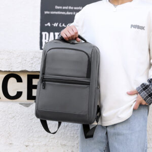 Person holding grey Customized Waterproof Travel Business Men Backpack Bags Laptop with Usb Charger-4